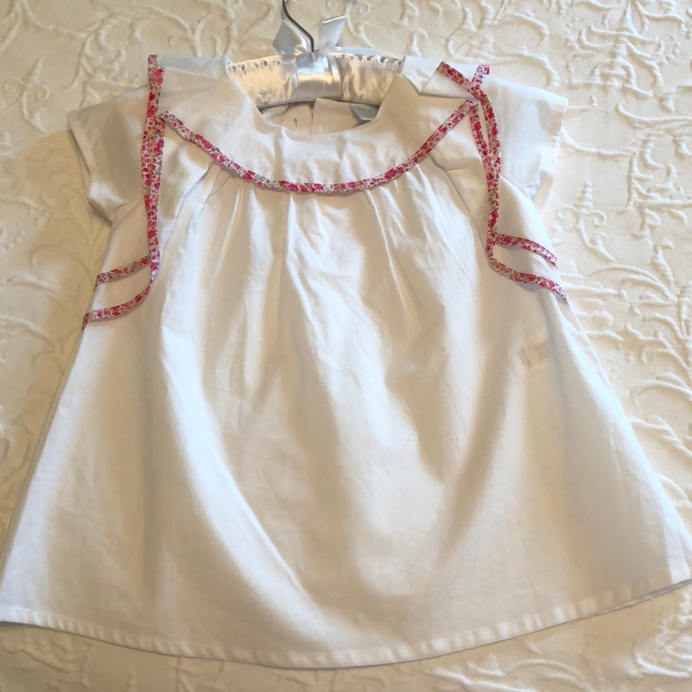 Shirts with pink floral trim